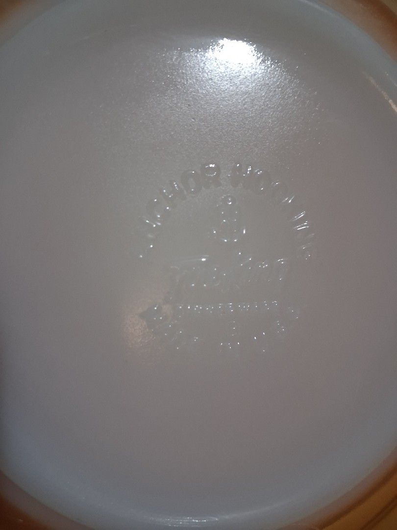 Anchor Hocking Fire King Peach Luster Bowl (Category: Dinnerware & Cutlery) located in Hinigaran. Submitted by faye_fab (Listing ID 1455225558, Image 3). Description: - Vintage Anchor Hocking Fire King bowl - Beautiful peach lusterware finish - Exterior swirl pattern - Perfect for serving or display - Approximately 8 inches in diameter - No chips or cracks observed.