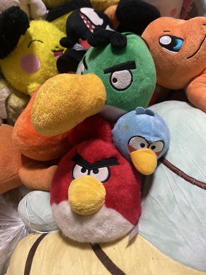 Angry Birds and other plush toys bundle (Category: Plushies & Soft Toys) located in Manila. Submitted by kuya_moto (Listing ID 1455214466, Image 1). Description: - Bundle of plush toys - Includes Angry Birds characters: Red, Bomb, Chuck - Also includes Pikachu and Charmander plushies - Perfect for collectors or children - Shows some wear and tear from previous love - Selling as a complete lot.