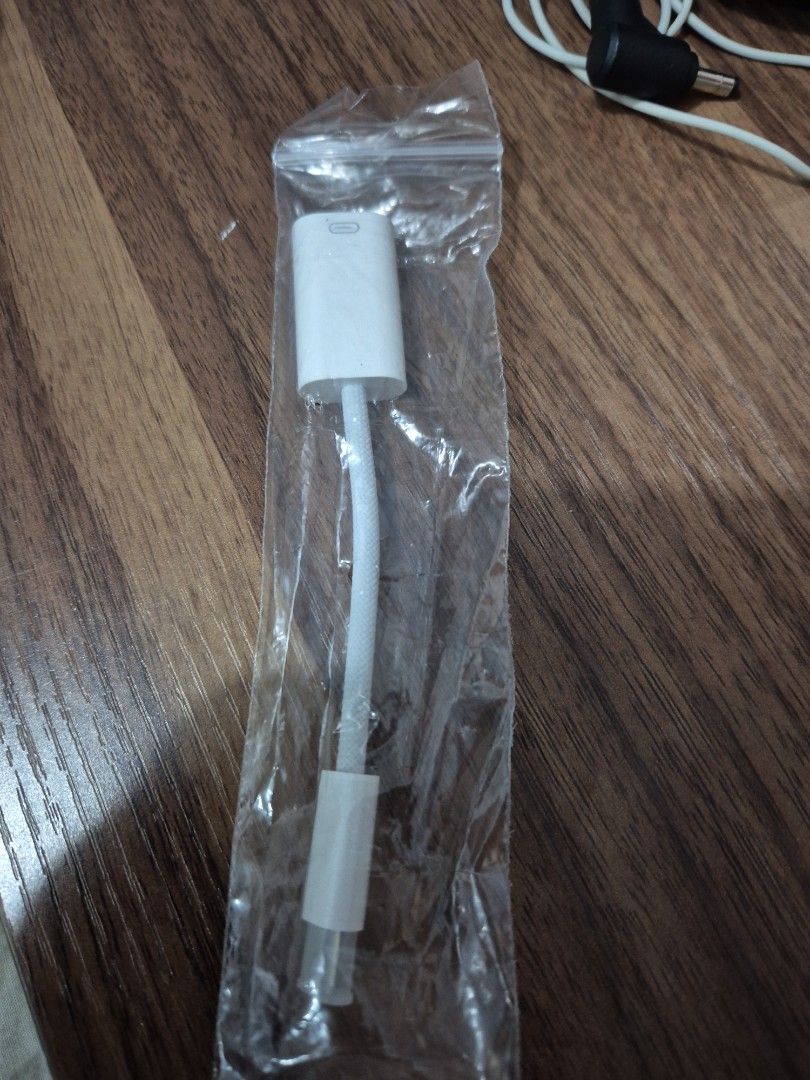 Generic Apple Lightning to usb c Adapter (Category: Chargers & Cables) located in Manila. Submitted by archie.v (Listing ID 1455215091, Image 1). Description: - no headset included selling only the Apple adapter to USB C. - Connect lightning headphones to iPhone/iPad/usb C - White color - Small and portable design - Simple to use.