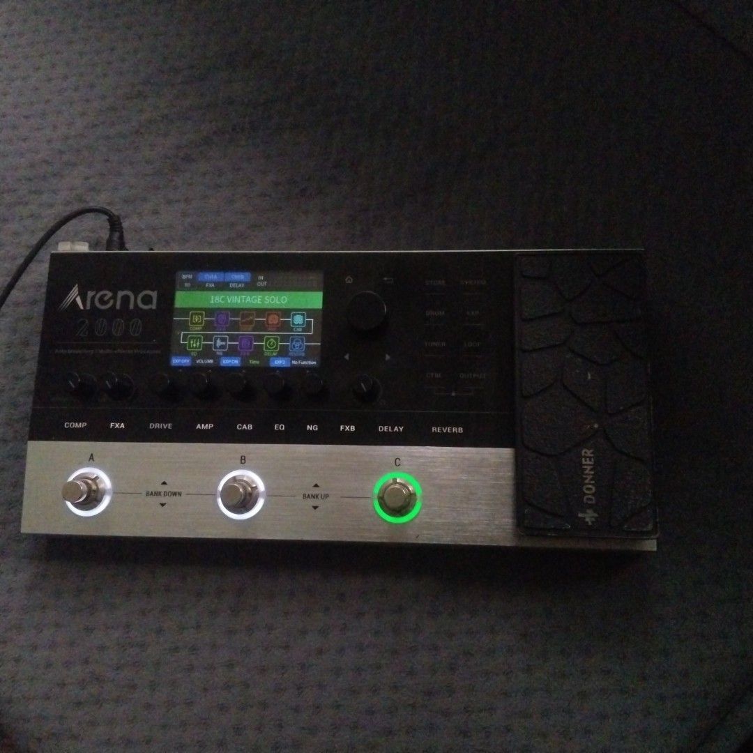 Donner Arena 2000 Amp Modeling Multi-Effects Processor (Category: Musical Instruments) located in Liloy. Submitted by joshuabula48818 (Listing ID 1455253819, Image 2). Description: - Donner Arena 2000 multi-effects processor - Features amp modeling and a wide range of effects - Built-in expression pedal for dynamic control - User-friendly interface with clear display and multiple controls - Ideal for guitarists of all levels - Includes original p