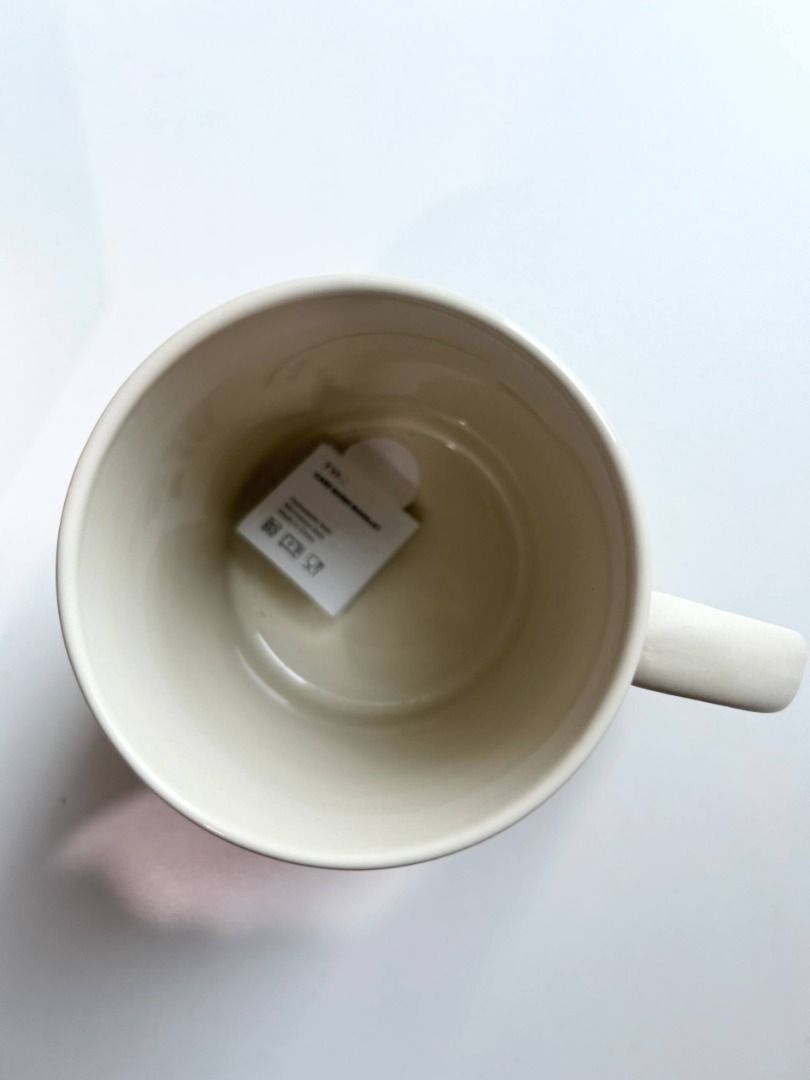"Ask Me About My Cat” Ceramic Mug (Category: Coffee & Tea Tableware) located in Manila. Submitted by softlysorted (Listing ID 1455195268, Image 3). Description: Cute ceramic mug from Typo featuring the phrase “Ask Me About My Cat” in purple print. Perfect for cat lovers, as a desk mug, or as a fun gift. • Authentic Typo item; designed in Australia • Neutral cream color with purple lettering • Dishwasher safe • Microwave safe • Care guide booklet 