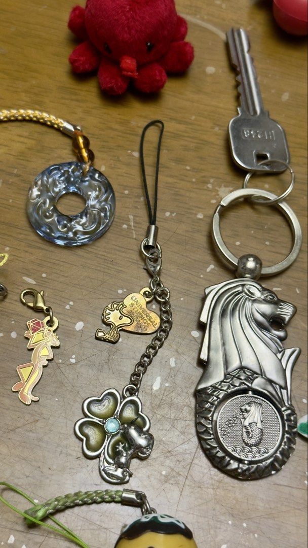 Assorted Keychain Charms: Anime, Car, Animals, and More! (Category: Character Goods) located in Pilar. Submitted by faveanyshop (Listing ID 1455249916, Image 3). Description: - Adorable keychain charms perfect for decorating bags and keys. - Featuring a variety of designs: anime characters, Spiderman, Pikachu, a cute fox, and a car. - Special souvenirs from Singapore: Merlion and Universal Studios Singapore charms. - Great for personalizing your 