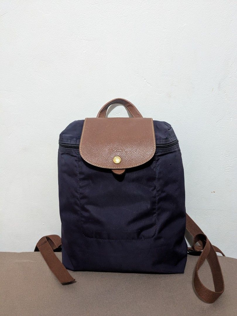 Authentic Longchamp backpack (Category: Luxury Bags & Wallets) located in Tuguegarao City. Submitted by globeeneace (Listing ID 1455255422, Image 1). Description: Guaranteed Original issue: Missing puller and minimal bubbles.