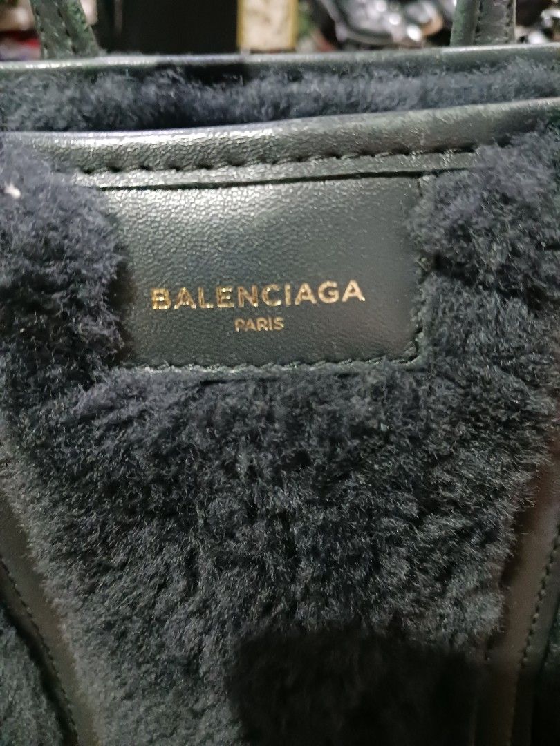 Balenciaga Shearling Tote Bag (Category: Luxury Bags & Wallets) located in Koronadal. Submitted by milagraciaukayukay123_. (Listing ID 1455195880, Image 2). Description: - Soft shearling material - Genuine leather handles and strap - Secure zipper closure with branded pull - Interior zipped pocket for essentials - Detachable shoulder strap for versatility - Ideal for everyday carry.