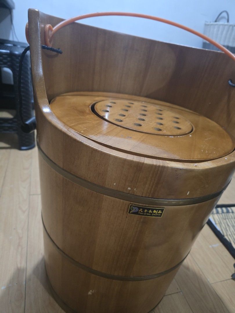 Barrel Wooden Bucket (Category: Shelves, Cabinets & Racks) located in Mandaluyong City. Submitted by mariasdesire (Listing ID 1455231833, Image 1). Description: - Sturdy wooden bucket with durable metal bands - Includes a convenient handle for carrying - Features a perforated lid for ventilation or display - Small spout inside, ideal for pouring or decorative effect - Versatile use: great for storage or as a charming decorative piece - Feel free 