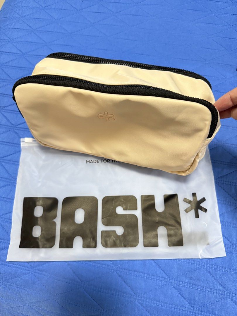 BASH Large weekender (Category: Cross-body Bags) located in Quezon City. Submitted by abyduvs (Listing ID 1455228001, Image 3). Description: - BASH* duffle bag and matching pouch set (Brand new) -original price 2,995.00 - Color: Sakura - Duffle features: Front pocket, interior compartments - Includes detachable shoulder strap - Ideal for travel or gym - Comes with original zip bag.