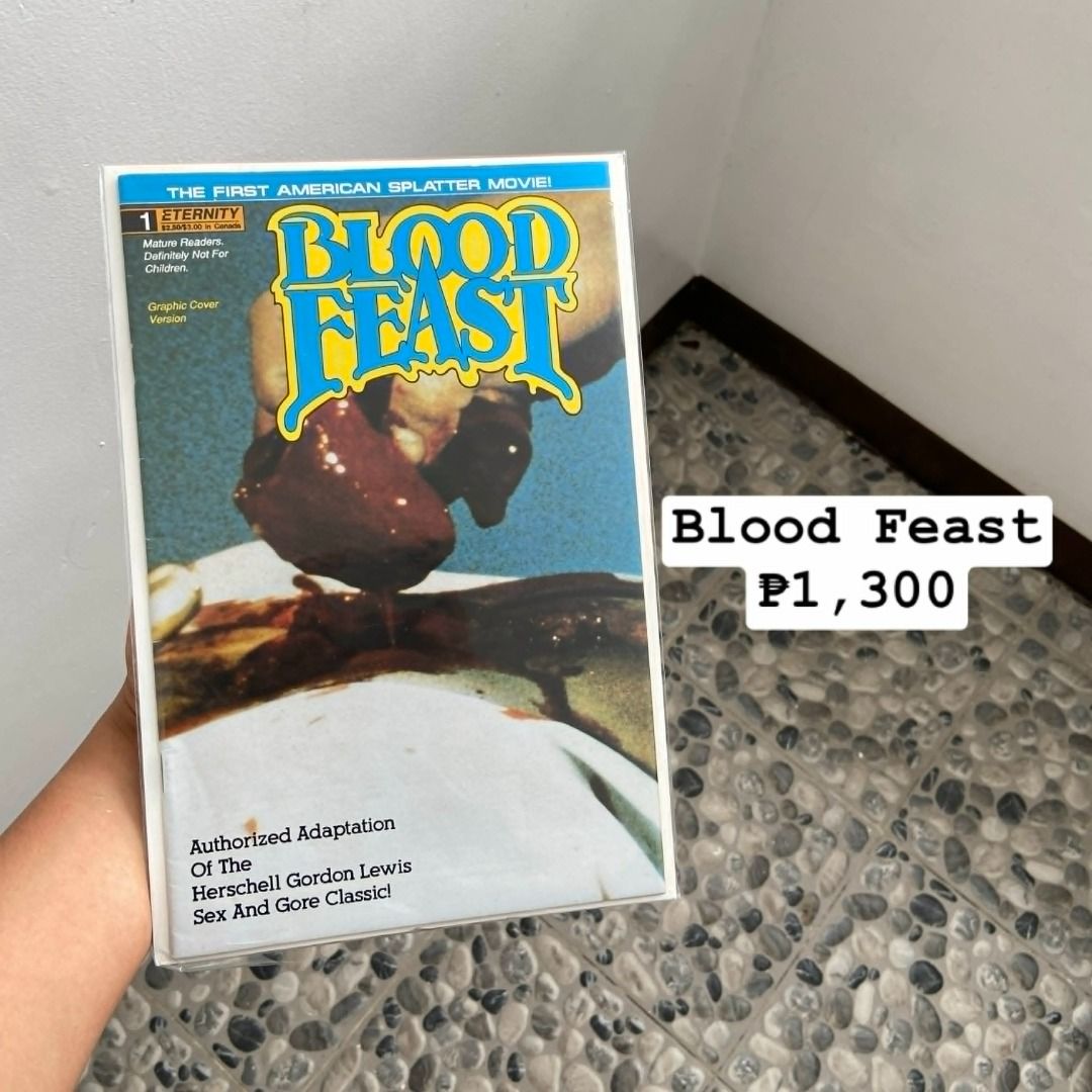 BLOOD FEAST COMIC BOOK - AUTHORIZED ADAPTATION (Category: Comics & Manga) located in Rizal. Submitted by chloeysabelperez-gonzalez (Listing ID 1455232462, Image 1). Description: - Blood Feast #1 from Eternity Comics - Authorized adaptation of the classic S/ex and Gore film - Features the cover stating it's the first American splatter movie - Unique item for collectors Please check photos for details! 📥 Message me for more photos/videos. 💸 MOP: 