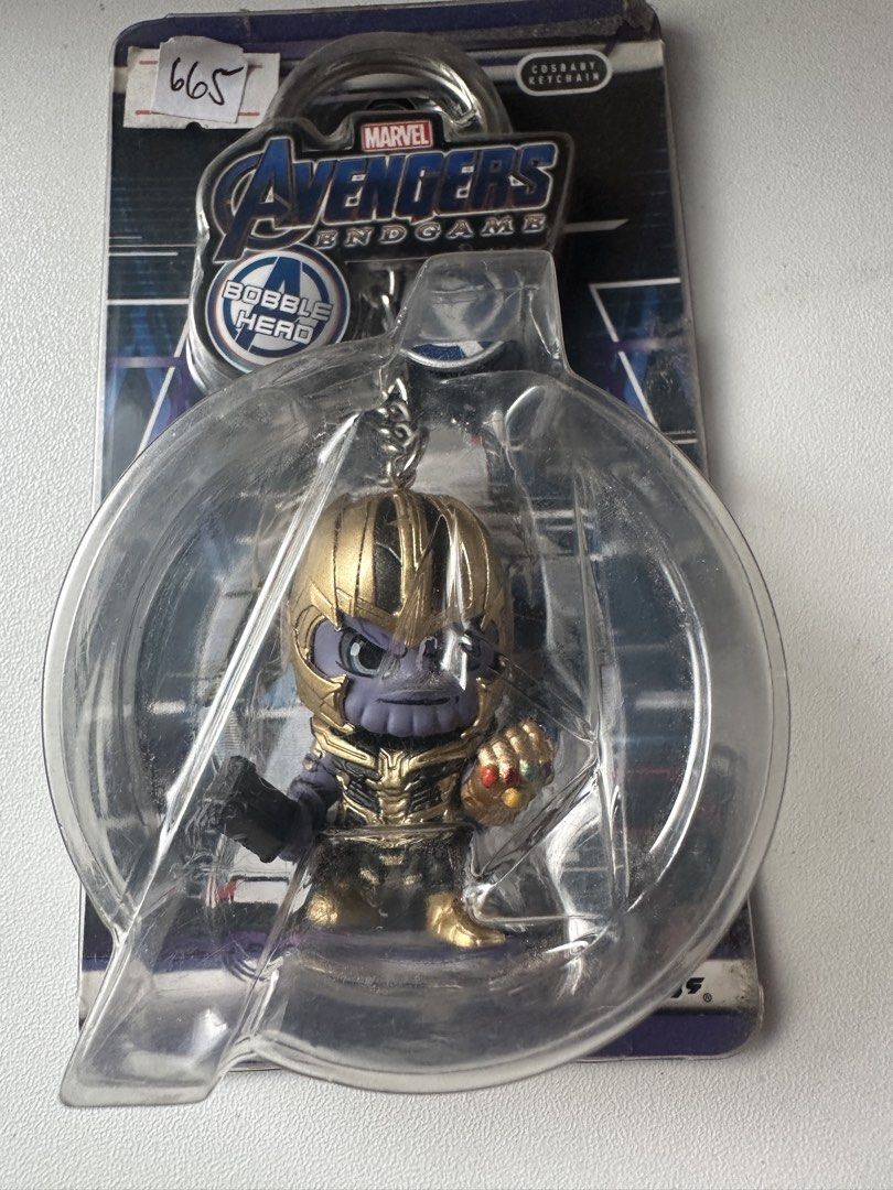 BUNDLE Hot Toys Thanos & Infinity Gauntlet Keychain (Category: Western Merchandise) located in Manila. Submitted by got_loots (Listing ID 1455234381, Image 2). Description: WTS❗️❗️❗️ BUNDLE Hot Toys Marvel Collectible Thanos Cosbaby Keychain Limited Edition 500 & Avengers Endgame Infinity Gauntlet Cosbaby Key chain ₱850 Only for both.