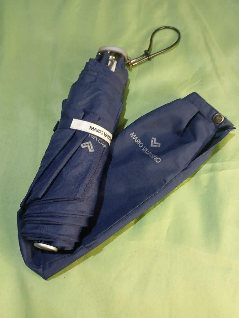 Foldable Umbrellas - Mario Valentino, Peter Rabbit, Pierre Cardin (Category: Umbrellas) located in Manila. Submitted by scherielar31543 (Listing ID 1455197568, Image 2). Description: foldable umbrellas - Includes: Navy blue Mario Valentino with sleeve - Dark blue Peter Rabbit with sleeve - Cream and black umbrella with dark sleeve - Purple and blue striped Pierre Cardin umbrella - Plain black umbrella available also other brand Puma, ungaro etc..