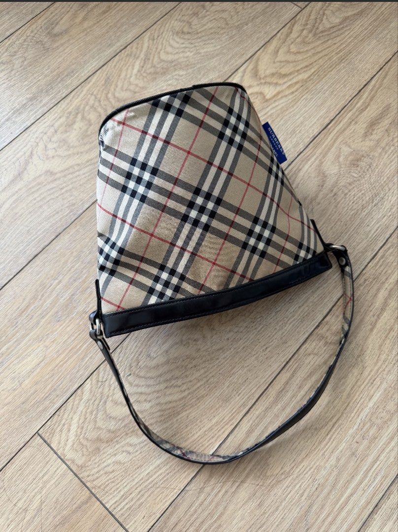 Burberry Nova Check Shoulder Bag (Category: Luxury Bags & Wallets) located in Makati City. Submitted by _jennn (Listing ID 1455245483, Image 1). Description: Needs cleaning. Negotiable :).