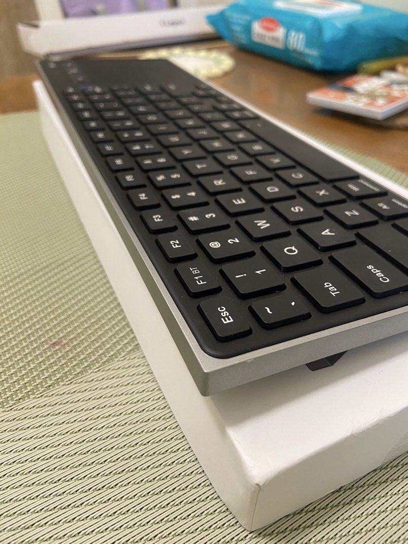 C2UR TouchBoard Pro Wireless Keyboard with Trackpad (Category: Computer Keyboard) located in Mandaluyong City. Submitted by sunflowerai (Listing ID 1455218086, Image 2). Description: - Wireless keyboard with integrated trackpad - Model: TouchBoard Pro - Connectivity: Bluetooth (indicated by 'BT' button) - Color: Silver and black - Ideal for clean desk setups - Includes original packaging Used only for 2 months. Really convenient to use. Original 
