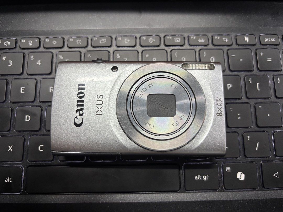 Canon IXUS 145 (Category: Cameras) located in Subic. Submitted by helenalagrada (Listing ID 1455244220, Image 1). Description: CANON IXUS 145 (Php 8,000) - Silver Canon IXUS digital camera - 8x optical zoom lens - Ideal for everyday photography - Compact and easy to carry - Ready for your next adventure - All buttons working - Flash working - no functional issues - minor scratches pm for details.