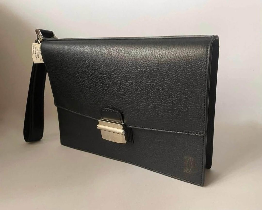 CARTIER CLUTCH PASHA WITH TAG (Category: Luxury Bags & Wallets) located in Cagayan de Oro. Submitted by moiobsession (Listing ID 1455250071, Image 3). Description: CARTIER Pasha Leather Clutch / Briefcase Unused • Complete Set • With Original Price Tag ✔ Authentic Cartier ✔ Unused condition ✔ Original price tag — $970 ✔ Comes with Cartier box, dust bag & papers ✔ Black grained leather ✔ Sleek, structured design ✔ Can be carried as a clutch or doc