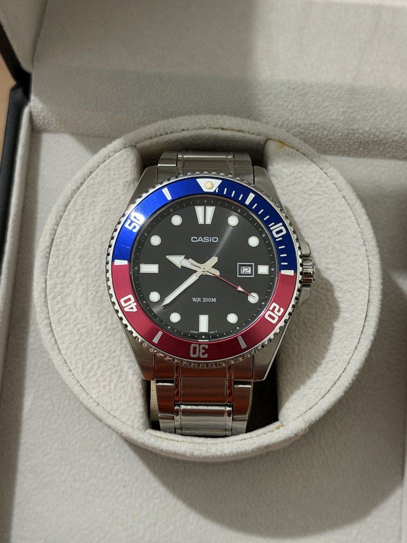 Casio Pepsi MDV-107 (Category: Men's Watches) located in Davao. Submitted by glydelleprgy (Listing ID 1455272816, Image 1). Description: Original/Authentic Complete Package with Hangtag, Module, International Warranty Card and Box Specifications Basic Information Case size (Lx Wx H) 49.5 × 44.2 × 12.1 mm Weight 144 g Case and bezel material Stainless steel / Aluminum Band Stainless Steel Band One-touch 3-fold Clasp Water resistance 200-meter wate