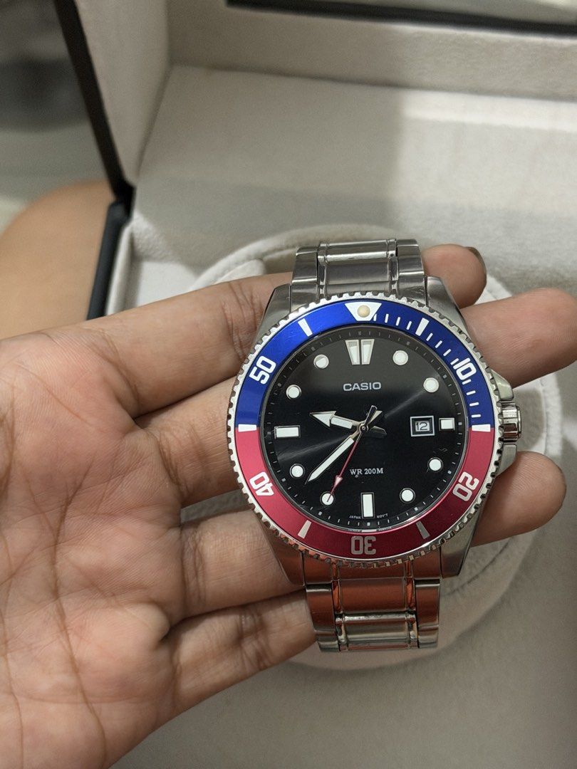 Casio Pepsi MDV-107 (Category: Men's Watches) located in Davao. Submitted by glydelleprgy (Listing ID 1455272816, Image 2). Description: Original/Authentic Complete Package with Hangtag, Module, International Warranty Card and Box Specifications Basic Information Case size (Lx Wx H) 49.5 × 44.2 × 12.1 mm Weight 144 g Case and bezel material Stainless steel / Aluminum Band Stainless Steel Band One-touch 3-fold Clasp Water resistance 200-meter wate