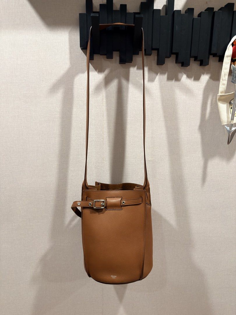 CELINE Paris (Auth) Tan Leather Crossbody Bag (Category: Luxury Bags & Wallets) located in Pasig City. Submitted by theclosetcasemanila (Listing ID 1455305029, Image 3). Description: - Guaranteed Authentic - Celine smooth tan leather crossbody bag - Elegant belt buckle closure on the front. Adjustable. - Classic, minimalist design - Very chic and unique - Expertly crafted in Italy No flaws. In good as new condition. No scratches. With dustbag. Ap