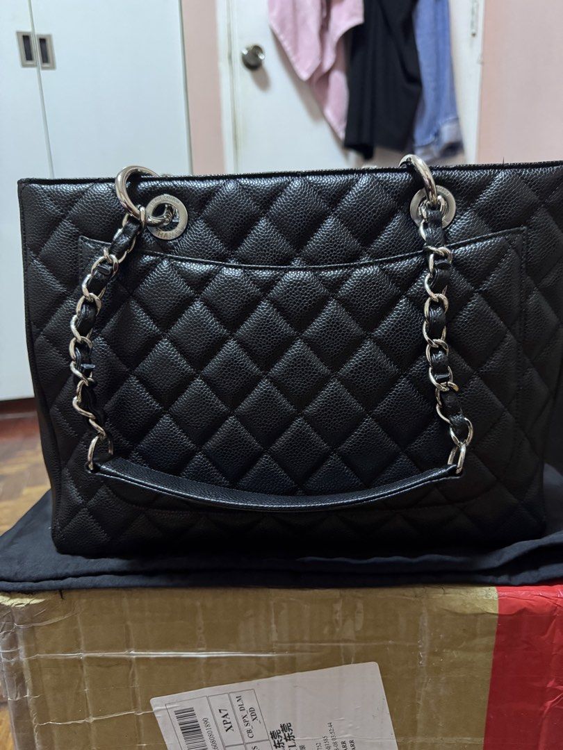 Chanel GST in Silver Hardware (Category: Luxury Bags & Wallets) located in Cabuyao City. Submitted by patitay.osa (Listing ID 1454341643, Image 3). Description: - Classic Chanel tote bag - Black caviar leather with diamond quilting - Iconic embossed CC logo on front - Silver chain straps with leather accents - Spacious interior, ideal for daily use or travel - A timeless wardrobe essential .Thank you.