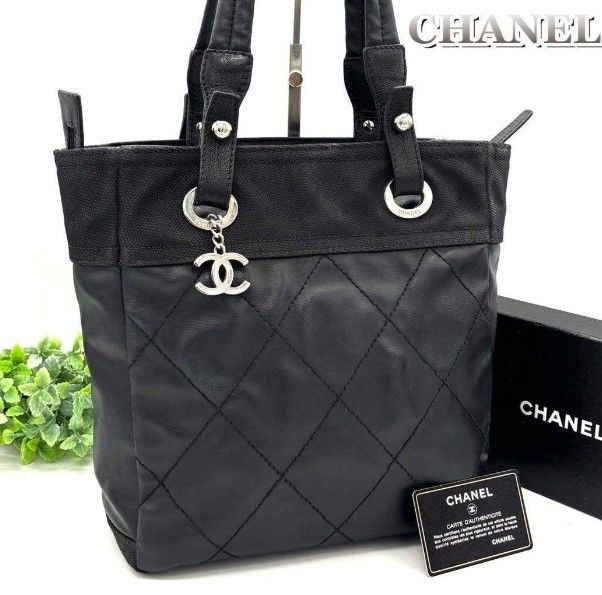 Chanel Paris Biarritz Pm tote black (Category: Luxury Bags & Wallets) located in Cavite. Submitted by ariachloe (Listing ID 1455286041, Image 1). Description: Material: Nylon Canvas × Leather 【Guarantee】Card included/Seal peeling off 【Size】Approx. W30cm × H25cm × D12cm 50% of the price is non- refundable to customers who decided not to purchase or return the item. Bank transfer is the only method of payment. Open for lay- away again, 50% of the i