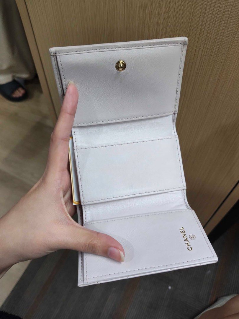 Chanel Quilted Compact Wallet (Category: Luxury Bags & Wallets) located in Leyte. Submitted by handmedownp (Listing ID 1452869415, Image 2). Description: Luxurious quilted leather Iconic CC logo detaisl Compact size Note: needs cleaning but overall still in VGUC With Legit Grails.