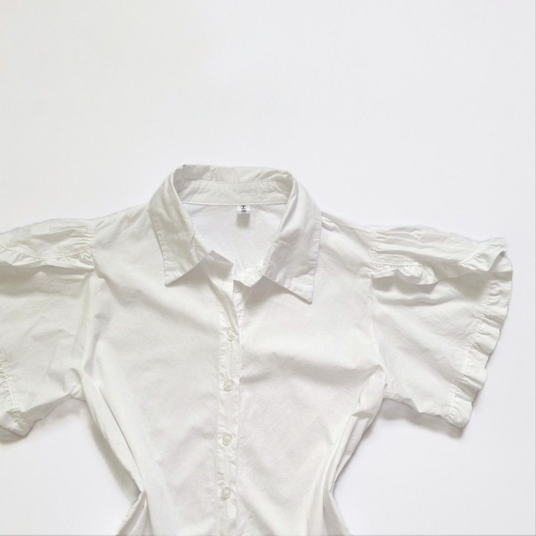 Chic White Button-Up Ruffle Short Sleeves (Category: Blouses) located in Tarlac. Submitted by cheesecaakee (Listing ID 1455231424, Image 2). Description: size: xs-s price + sf mop: Gcash | MariBank mod: J&T.