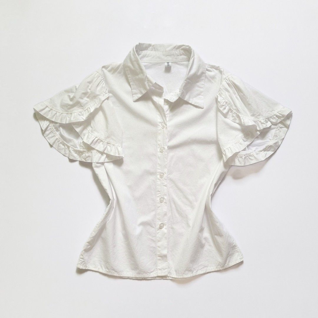 Chic White Button-Up Ruffle Short Sleeves (Category: Blouses) located in Tarlac. Submitted by cheesecaakee (Listing ID 1455231424, Image 3). Description: size: xs-s price + sf mop: Gcash | MariBank mod: J&T.