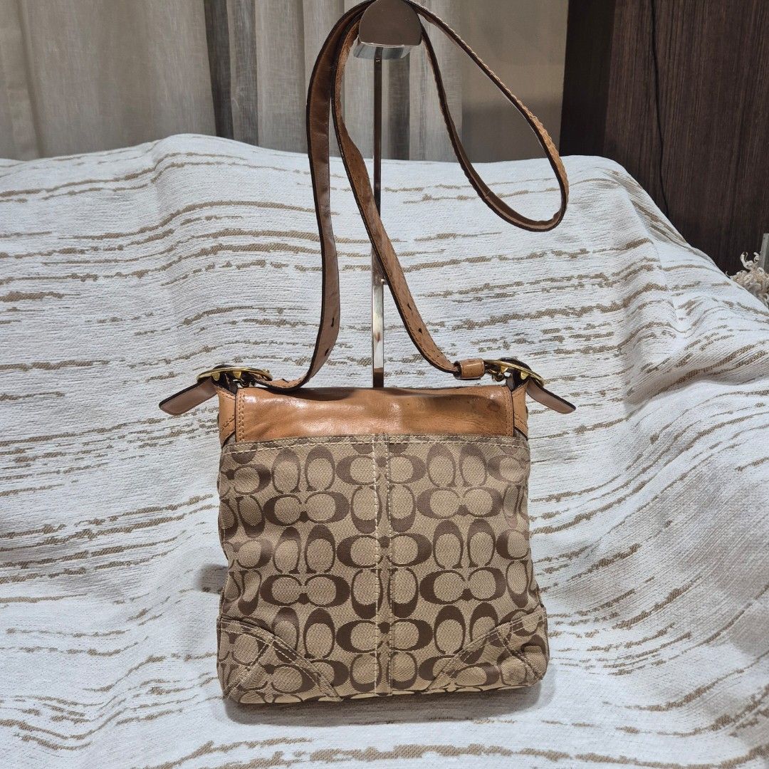 Coach Monogram Bleecker Leather Trim Shoulder Bag (Category: Luxury Bags & Wallets) located in Quezon City. Submitted by prelovedluxury21 (Listing ID 1455186628, Image 3). Description: - Authentic Coach shoulder bag - Classic monogram canvas with tan leather trim - Features a large buckle detail on the flap - Adjustable leather strap - Gold hardware - Ideal for everyday use.
