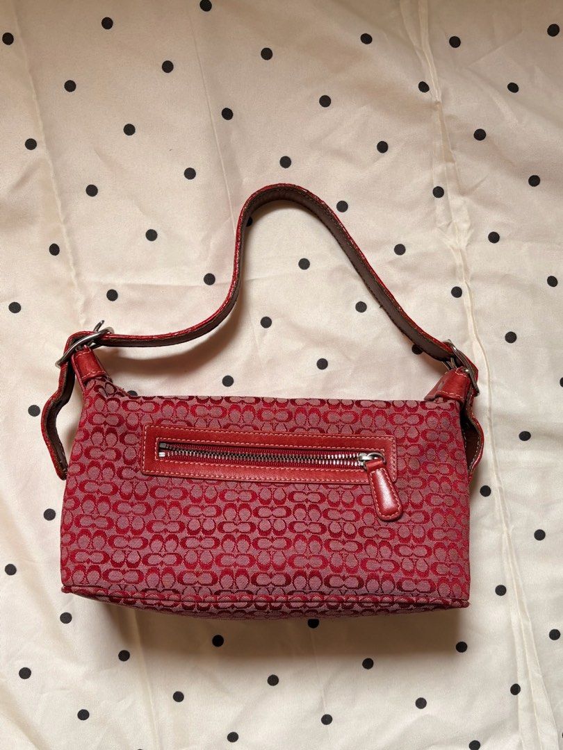 Coach Monogram Canvas Shoulder Bag Red (Category: Luxury Bags & Wallets) located in Angeles City. Submitted by tk_.collections (Listing ID 1455319236, Image 1). Description: -Clean body (like new) -No rubs -with hangtag -Intact creed -Clean interior (ready to use) Issue only: rubber lining/leather.