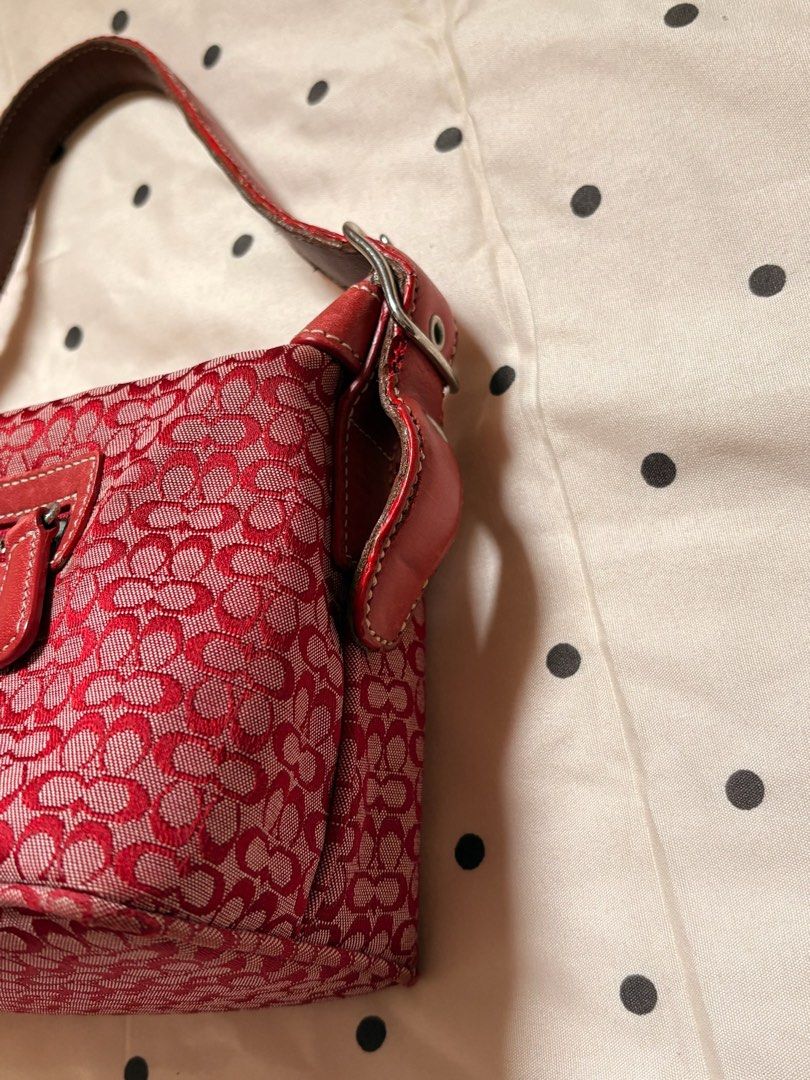 Coach Monogram Canvas Shoulder Bag Red (Category: Luxury Bags & Wallets) located in Angeles City. Submitted by tk_.collections (Listing ID 1455319236, Image 2). Description: -Clean body (like new) -No rubs -with hangtag -Intact creed -Clean interior (ready to use) Issue only: rubber lining/leather.