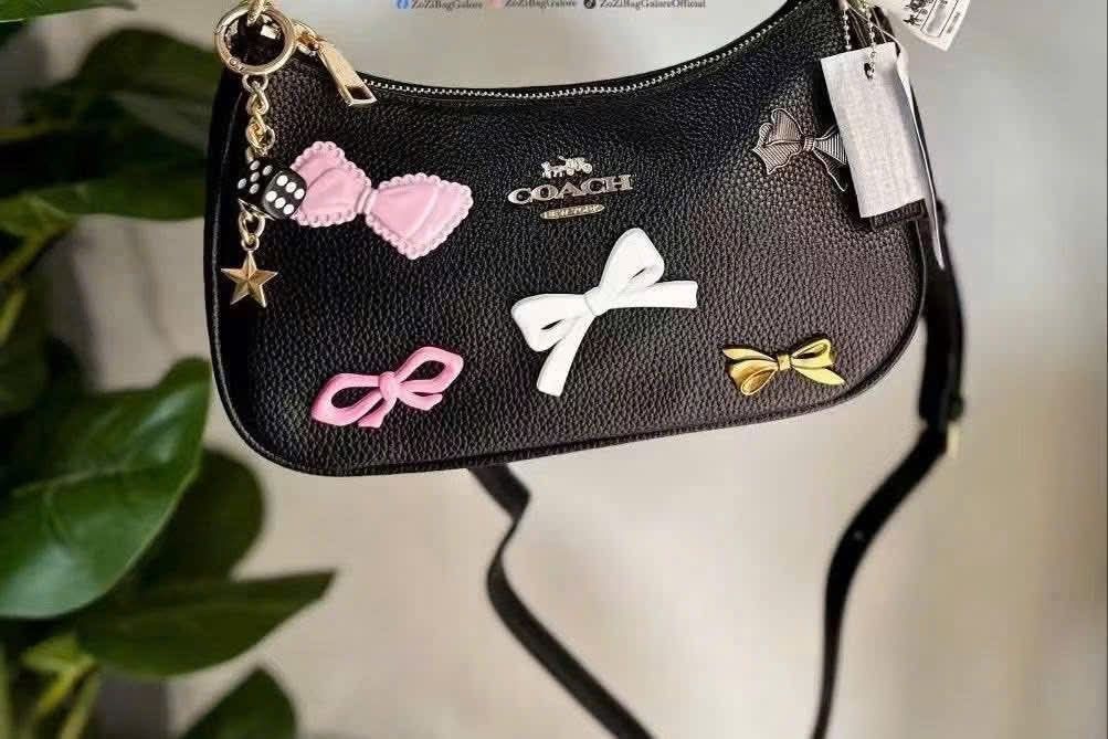 Coach Teri Shoulder Bag with Patches (Category: Shoulder Bags) located in Quezon City. Submitted by bagsboutiqueph (Listing ID 1455206657, Image 2). Description: LAST PRICE POSTED. LIMITED STOCKS! BRANDNEW WITH INCLUSIONS. COLOR MAY SLIGHTLY VARY IN ACTUAL DUE TO LIGHTING AND CAMERA SETTING. OTHER PHOTOS WILL BE SEND DURING PURCHASE AND FOR SURE BUYERS ONLY. WHEN IN DOUBT, DO NOT ORDER. THANK YOU..