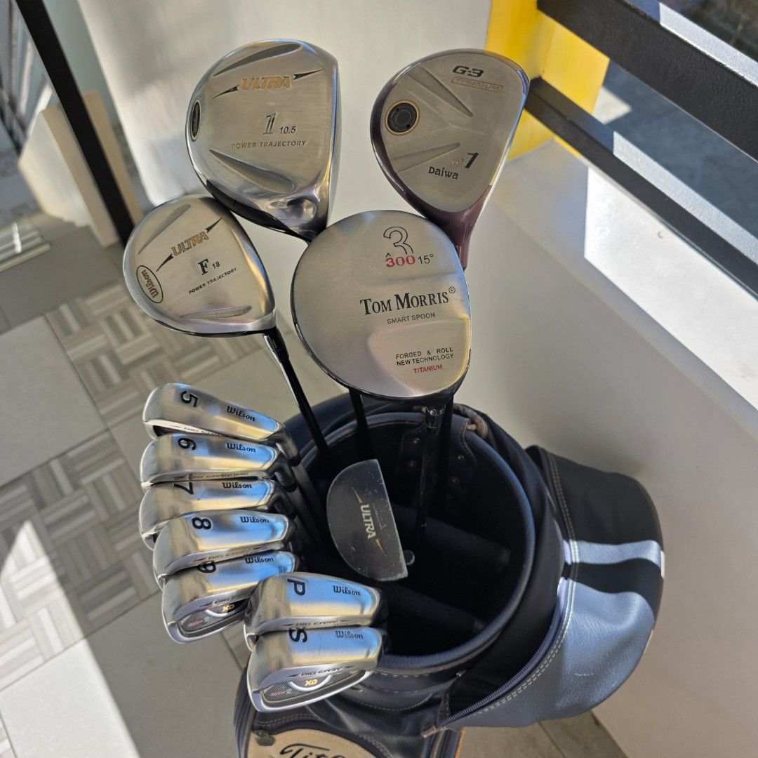 Complete Wilson and Mixed Woods Golf Set (Category: Golf) located in Calamba. Submitted by z1meister (Listing ID 1455273784, Image 2). Description: ⛳ FOR SALE: Complete Wilson & Mixed Woods Golf Set with Titleist Bag! ⛳ ​Looking for a highly forgiving, complete 13-piece setup to get you on the course? This set features easy-to-hit Wilson Big Easy XD irons, a versatile mix of woods including two drivers, and a premium Titleist cart bag. A great st