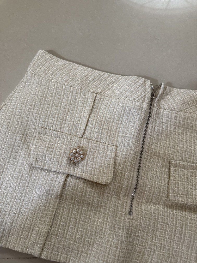cream beige tweed like mini skirt (Category: Skirts) located in Cavite. Submitted by vmlr_ (Listing ID 1455191121, Image 2). Description: ship from dasma cavite rfs: decluttering mop: bpi/maya/gcash/gogoexpress cod.