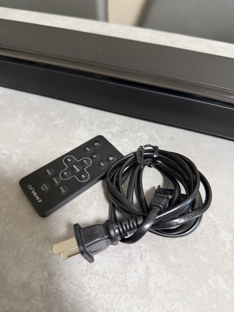 Devant SB-50 Soundbar with Remote and Power Cable (Category: Soundbars, Speakers & Amplifiers) located in Taytay. Submitted by thestyletwins (Listing ID 1455187590, Image 2). Description: - Devant SB-50 Soundbar - Includes remote control and power cable - Connectivity: Bluetooth, AUX, USB - Enhances your TV audio experience - Compact design, fits easily in front of most TVs - Convenient top buttons for standby, volume, and input selection.