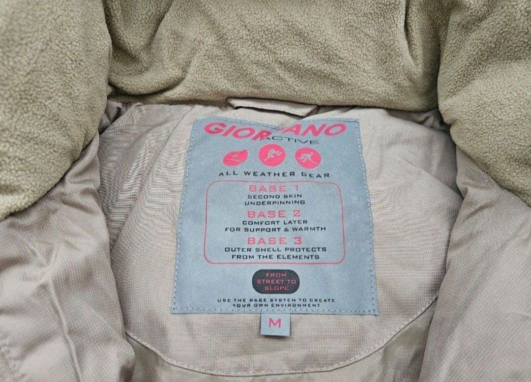 Down Jacket (Category: Coats, Jackets and Outerwear) located in Singapore. Submitted by ginger.flower (Listing ID 1455273186, Image 3). Description: - Brand: Giordana - Type: Down Puffer Jacket - Colour: Beige - Size: M (UK 10 / US 6) - Keeps you warm n stylish - Features: Detachable faux fur trimmed hood, layered design for warmth and protection - Condition: Great - Style: Suitable for winter wear and sub zero weather outdoor activities -Ptp: 50