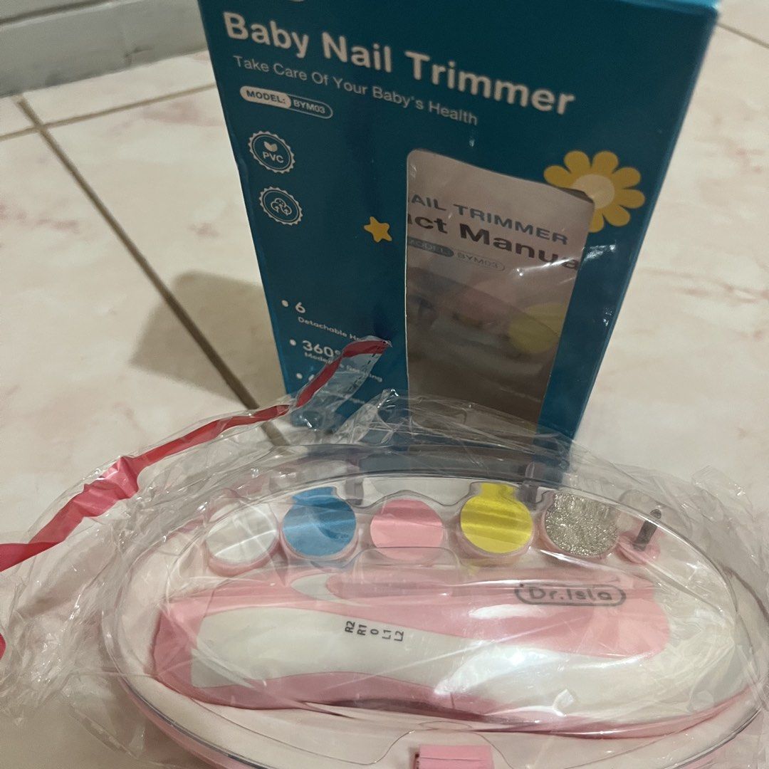 Dr. Isla Baby Nail Trimmer (Category: Baby Toiletries & Grooming) located in Taguig. Submitted by belinda.space (Listing ID 1455271117, Image 1). Description: - Brand: Dr. Isla - Model: BYM03 - Product: Baby Nail Trimmer - Features: 6 Detachable Heads, 360° Moderate Rotating, 60 Decibels Light Sound - Design: Ergonomic, gentle on baby's nails - Color: Pink (as shown in image) - Purpose: Safe and efficient nail trimming for infants and toddlers.
