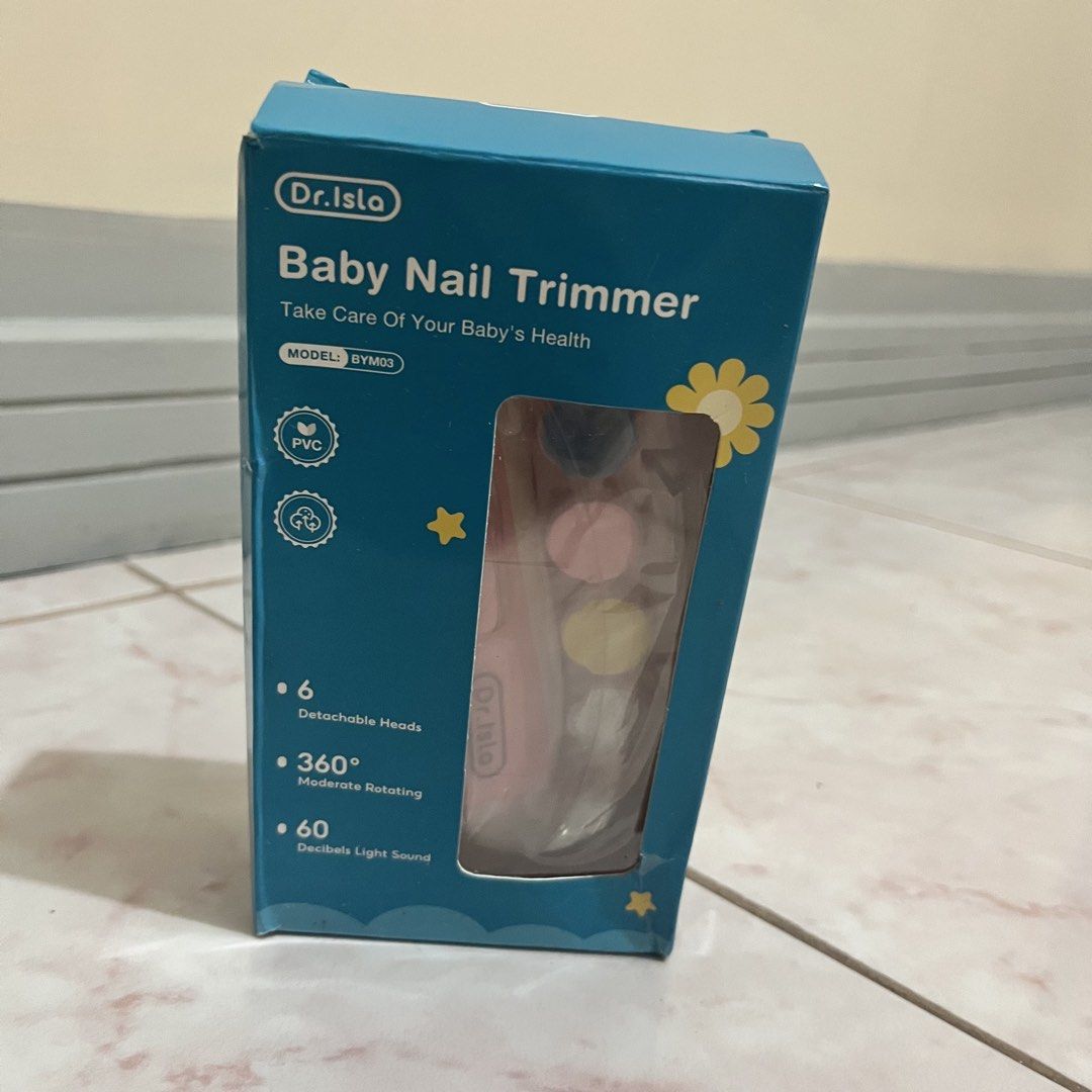 Dr. Isla Baby Nail Trimmer (Category: Baby Toiletries & Grooming) located in Taguig. Submitted by belinda.space (Listing ID 1455271117, Image 3). Description: - Brand: Dr. Isla - Model: BYM03 - Product: Baby Nail Trimmer - Features: 6 Detachable Heads, 360° Moderate Rotating, 60 Decibels Light Sound - Design: Ergonomic, gentle on baby's nails - Color: Pink (as shown in image) - Purpose: Safe and efficient nail trimming for infants and toddlers.