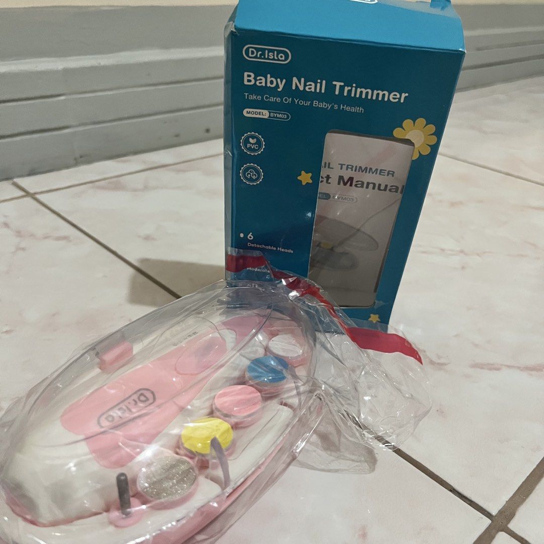Dr. Isla Baby Nail Trimmer (Category: Baby Toiletries & Grooming) located in Taguig. Submitted by belinda.space (Listing ID 1455271117, Image 2). Description: - Brand: Dr. Isla - Model: BYM03 - Product: Baby Nail Trimmer - Features: 6 Detachable Heads, 360° Moderate Rotating, 60 Decibels Light Sound - Design: Ergonomic, gentle on baby's nails - Color: Pink (as shown in image) - Purpose: Safe and efficient nail trimming for infants and toddlers.