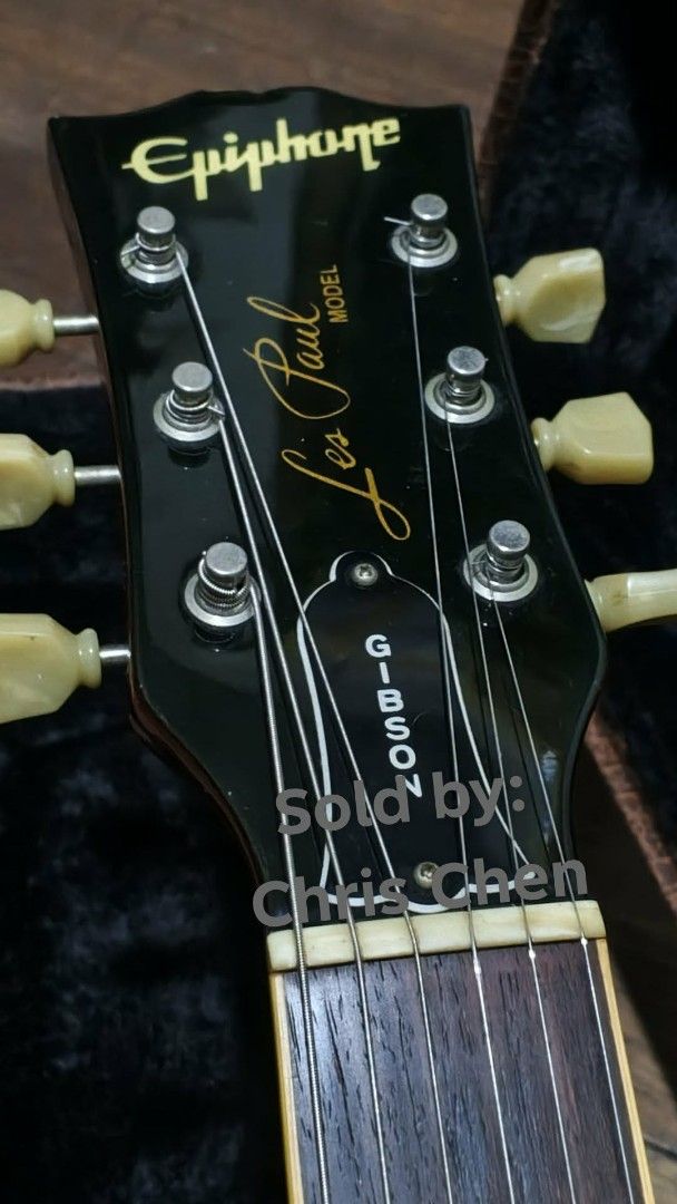 Epiphone Les Paul MIJ (Category: Musical Instruments) located in Manila. Submitted by retroactive_items (Listing ID 1455166095, Image 3). Description: Brand: Epiphone Model: Les Paul (gibson style headstock) Year: 1999 Origin: Made in Japan Color: Plain Top / Cherry Sunburst Condition: Good Condition with light scratches, dents and dings. With fret wear On 1st to 3rd fret wires, No fret Buzz. With Pickguard *No issue on useability Upgraded / Non-