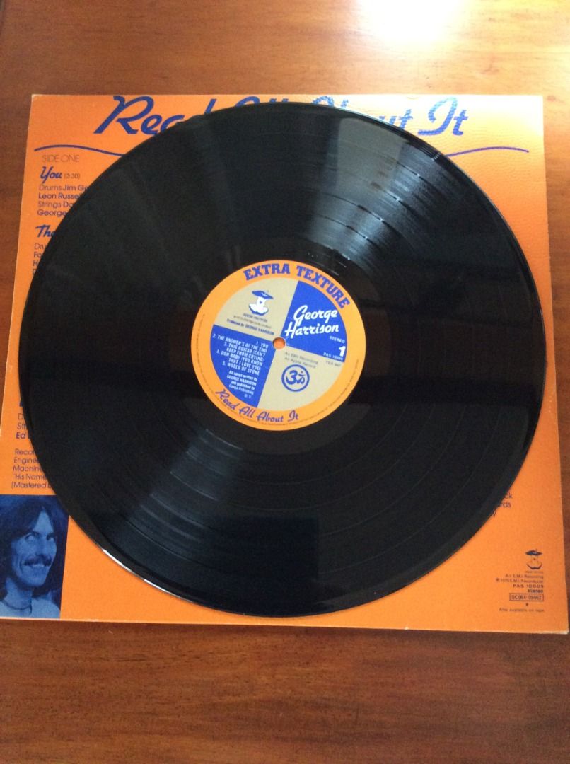George Harrison "Extra Texture" Vinyl Record (Category: Vinyls) located in Silang. Submitted by lorenzo0000 (Listing ID 1455169748, Image 3). Description: - George Harrison's 'Extra Texture' vinyl record - Features popular tracks: 'You', 'The Answer's At The End', 'This Guitar (Can't Keep From Crying)', 'A Bit More Of You', and 'His Name Is Legs (Ladies & Gentlemen)' - Produced by George Harrison - An excellent addition to any vinyl collection.
