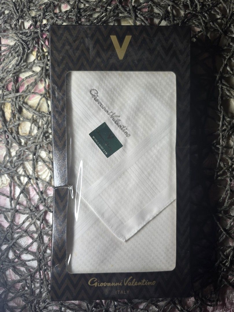 Giovanni Valentino White Handkerchief Set (Category: Handkerchief & Pocket Squares) located in Zamboanga. Submitted by lunavinum (Listing ID 1455142445, Image 2). Description: - Giovanni Valentino Handkerchiefs - Made in Italy - 100% Soft Cotton Material - Classic, Timeless Design - Ideal for Formal Wear or Everyday Use - Presented in an Elegant Gift Box.
