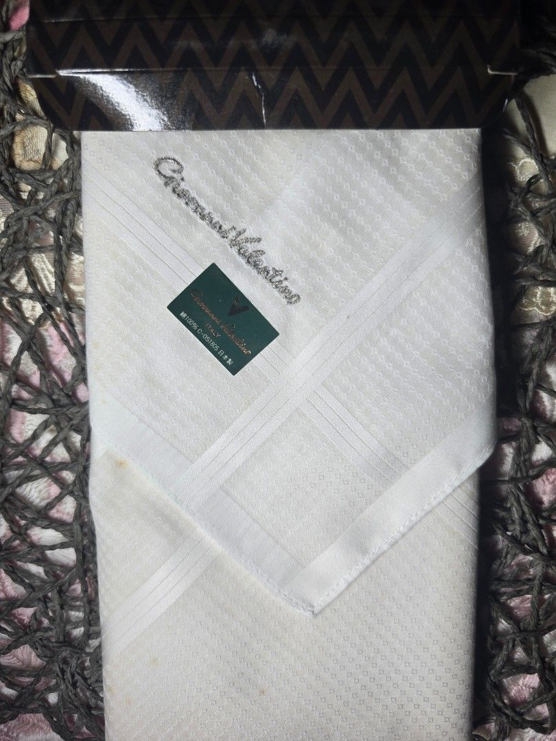 Giovanni Valentino White Handkerchief Set (Category: Handkerchief & Pocket Squares) located in Zamboanga. Submitted by lunavinum (Listing ID 1455142445, Image 1). Description: - Giovanni Valentino Handkerchiefs - Made in Italy - 100% Soft Cotton Material - Classic, Timeless Design - Ideal for Formal Wear or Everyday Use - Presented in an Elegant Gift Box.