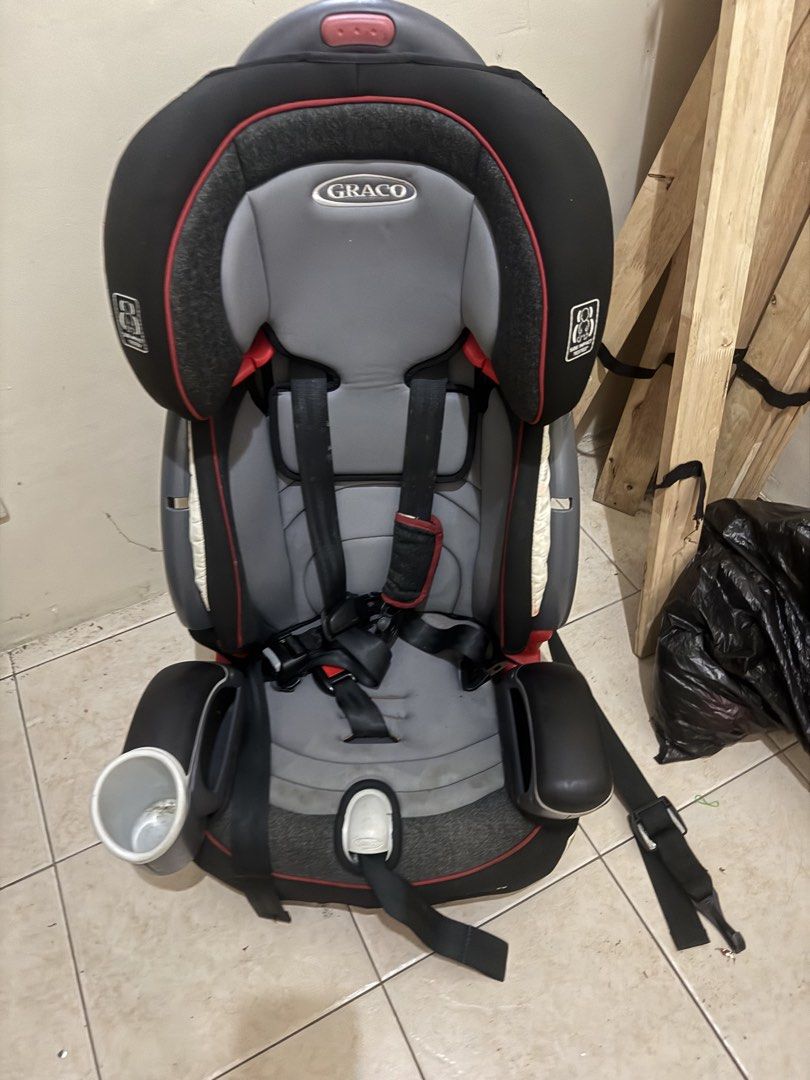 Graco Car Seat with Cup Holder (Category: Car Seats) located in Taguig. Submitted by ge.yangson (Listing ID 1455306370, Image 1). Description: - Graco car seat for child safety on the road. - Features a convenient side cup holder. - Adjustable straps ensure a secure and comfortable fit. - Padded for extra comfort for little ones. - Ready for its next adventure!.