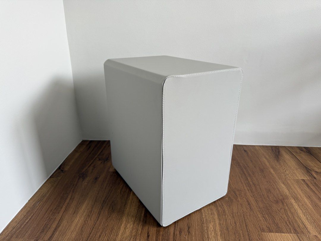 Grey 2-Drawer Bedside Table with Interchangeable Knobs (Category: Tables & Sets) located in Singapore. Submitted by jellypoop (Listing ID 1455146055, Image 2). Description: - Grey bedside table - Two smooth-gliding drawers - Comes with a set of colorful knobs (blue, yellow, pink, red, white) for customization - Dimensions: 47cm (Height) x 40cm (Width) x 30cm (Length).