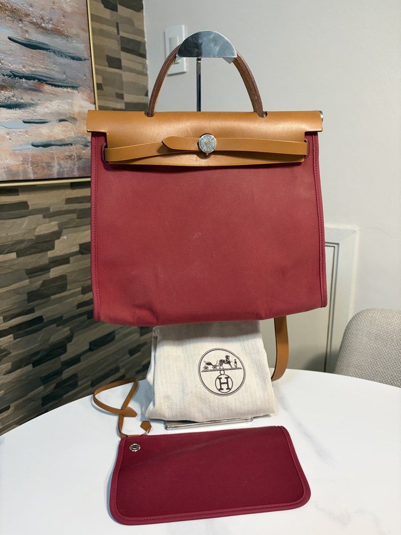 Hermes herbag (Category: Luxury Bags & Wallets) located in Las Pinas. Submitted by lovedmnl (Listing ID 1455214526, Image 1). Description: With dustbag And pouch Has some bubblings on the canvas No keys and lock No .