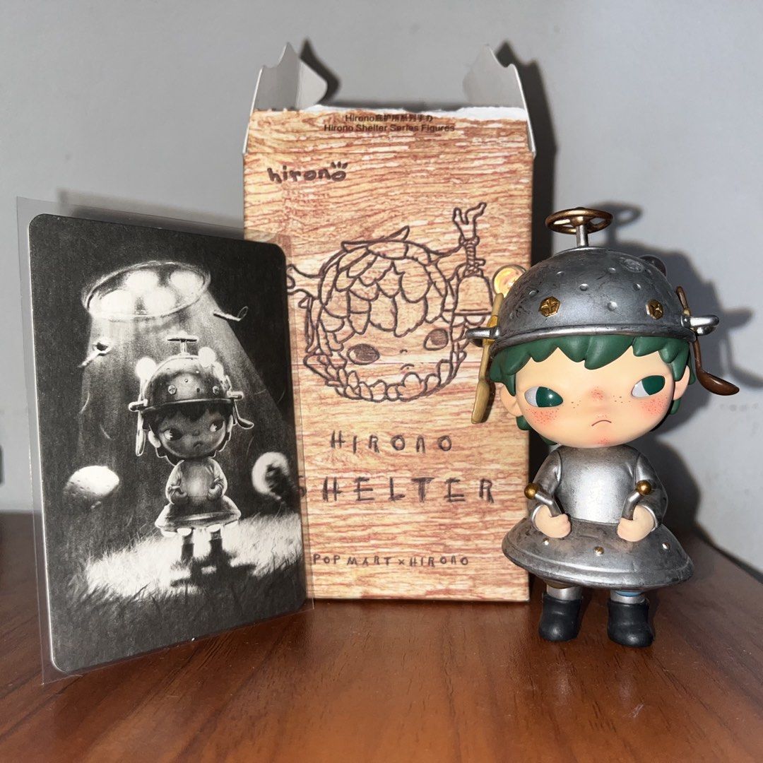 Hirono Shelter Series Alien (Category: Designer & Blind Box Toys) located in Antipolo. Submitted by midcloset (Listing ID 1455263346, Image 1). Description: Authentic, purchased from Pop Mart Japan 🇯🇵 With Box & Card included. The Alien figure from the Pop Mart Hirono Shelter Series represents the feeling of being misunderstood, out of place, or like an outsider in a complex world. The entire Shelter collection portrays Hirono seeking emotional