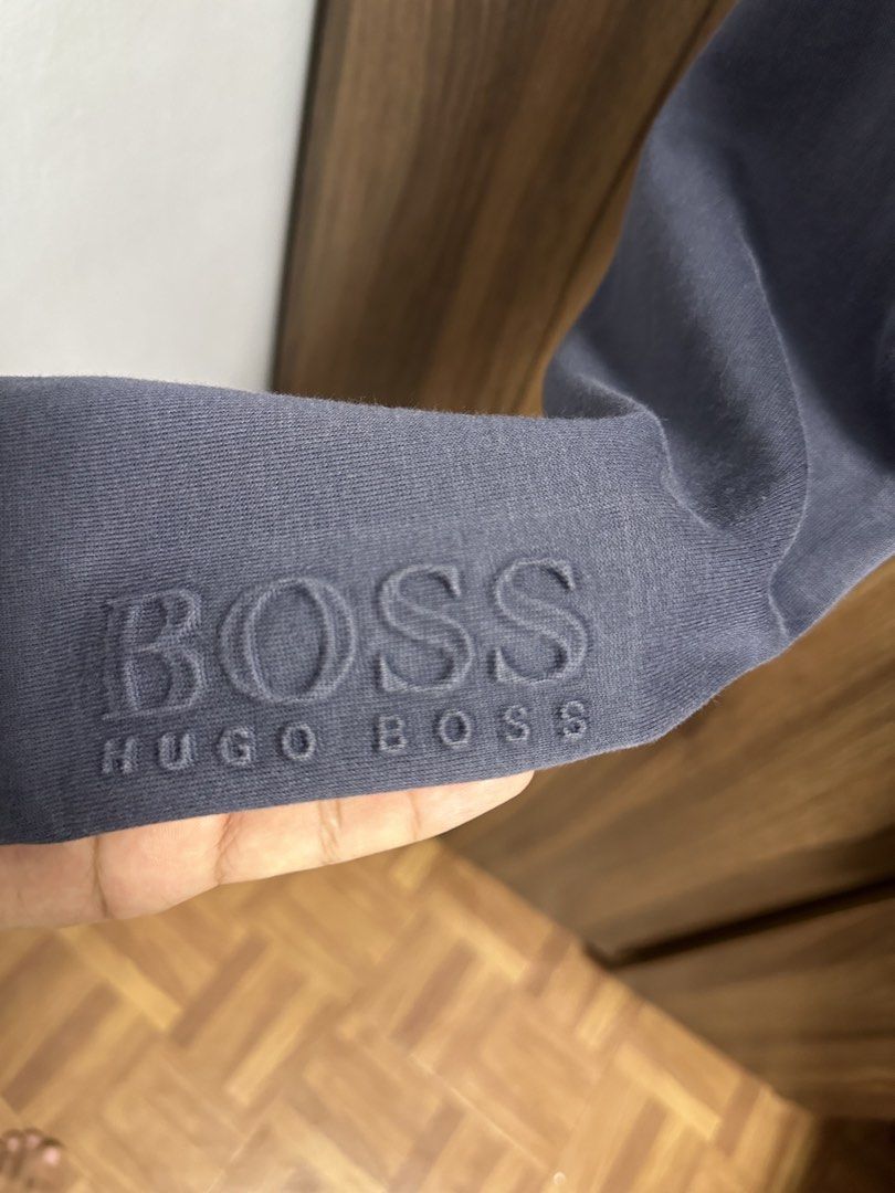 Hugo Boss Grey Sweatpants Joggers (Category: Joggers) located in General Trias. Submitted by jd_15 (Listing ID 1455304018, Image 3). Description: - Grey Hugo Boss sweatpants - Elastic waistband with drawstring - Two side pockets - One back pocket - Embossed BOSS HUGO BOSS logo on left leg near hem - Comfortable for lounging and casual wear.