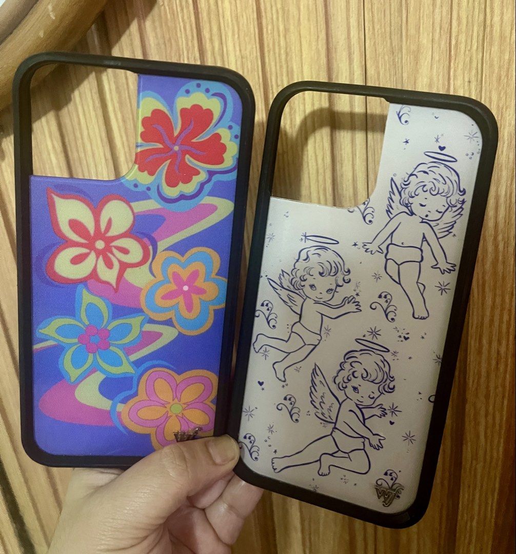 Iphone 12 Pro Max Wildflower Cases (both for 250) (Category: Cases & Sleeves) located in Lucena. Submitted by bestfindsbyellie (Listing ID 1455316790, Image 1). Description: For iphone 12 pro max lightly used, no issues Take both for only 250 plus sf shipping via J&T location: Lucena.