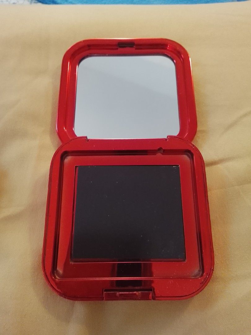 Sunnies Face White Compact (Category: Makeup) located in Bacoor. Submitted by worldstarr (Listing ID 1455184505, Image 3). Description: Includes a white Sunnies Face compact with mirror and lilac cream blush (sanitized and depotted from Detail cosmetics Haze).