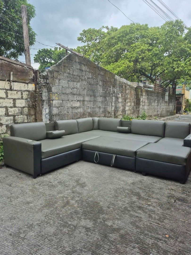 Italian leather Ushape sofa with pullout bed (Category: Sofas) located in Manila. Submitted by jjgoldfurniture (Listing ID 1455320982, Image 2). Description: Italian leather cover size 118x118x72 inches with storage with stainless cup holder and flip cup with backpillows and throwpillows.