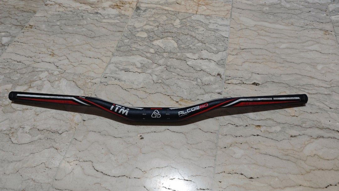 ITM ALCOR 80 Bicycle Handlebar (Category: Bicycles) located in Tarlac. Submitted by limidoloy191416 (Listing ID 1455207313, Image 1). Description: - ITM ALCOR 80 Handlebar - Color: Black with Red and White Accents - Ideal for Mountain Biking - Condition: Please check photos for details - Ready for your next ride!.