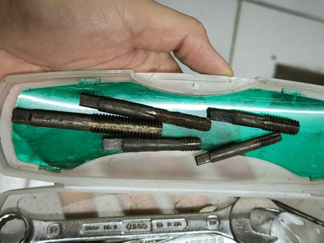 Japan surplus Tap Set for Threading (5 Pieces with Storage Case (Category: Construction Tools & Equipment) located in Angeles City. Submitted by yellowbrickstore (Listing ID 1455242186, Image 2). Description: 5-piece hand tap set housed in its original plastic case. Perfect for metalworking, machining, thread repair, or DIY projects. Quantity: 5 assorted hand taps Condition: Used, with natural surface patina/rust from age, but all threads and squ